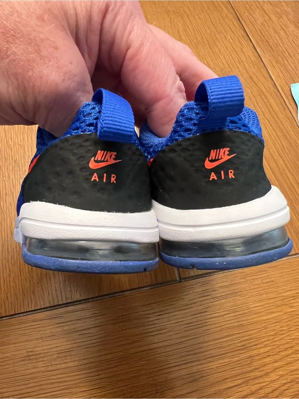 Nike Air Kids Blue Sneakers with Bright Orange Swoosh